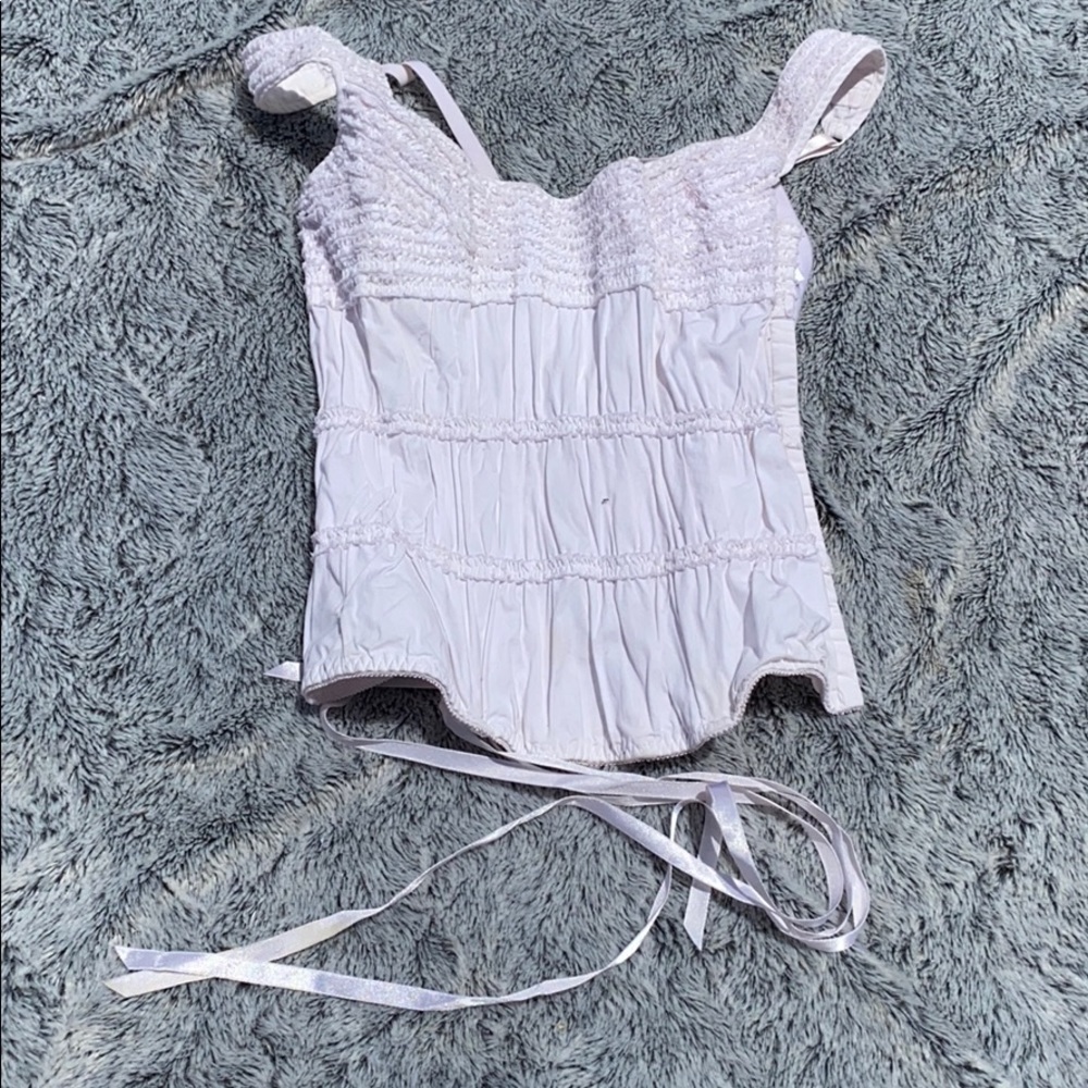 White ruffles corset
